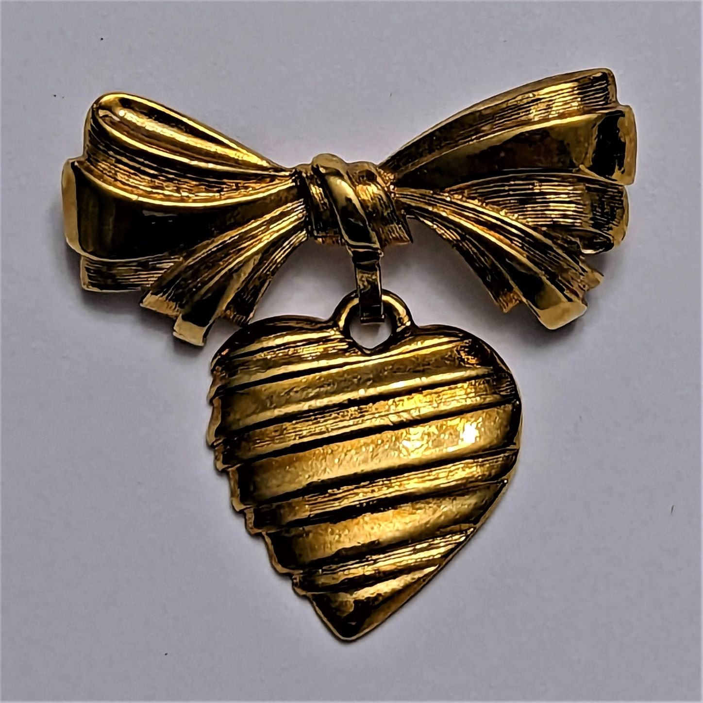 Avon Bow and Heart Brooch - signature