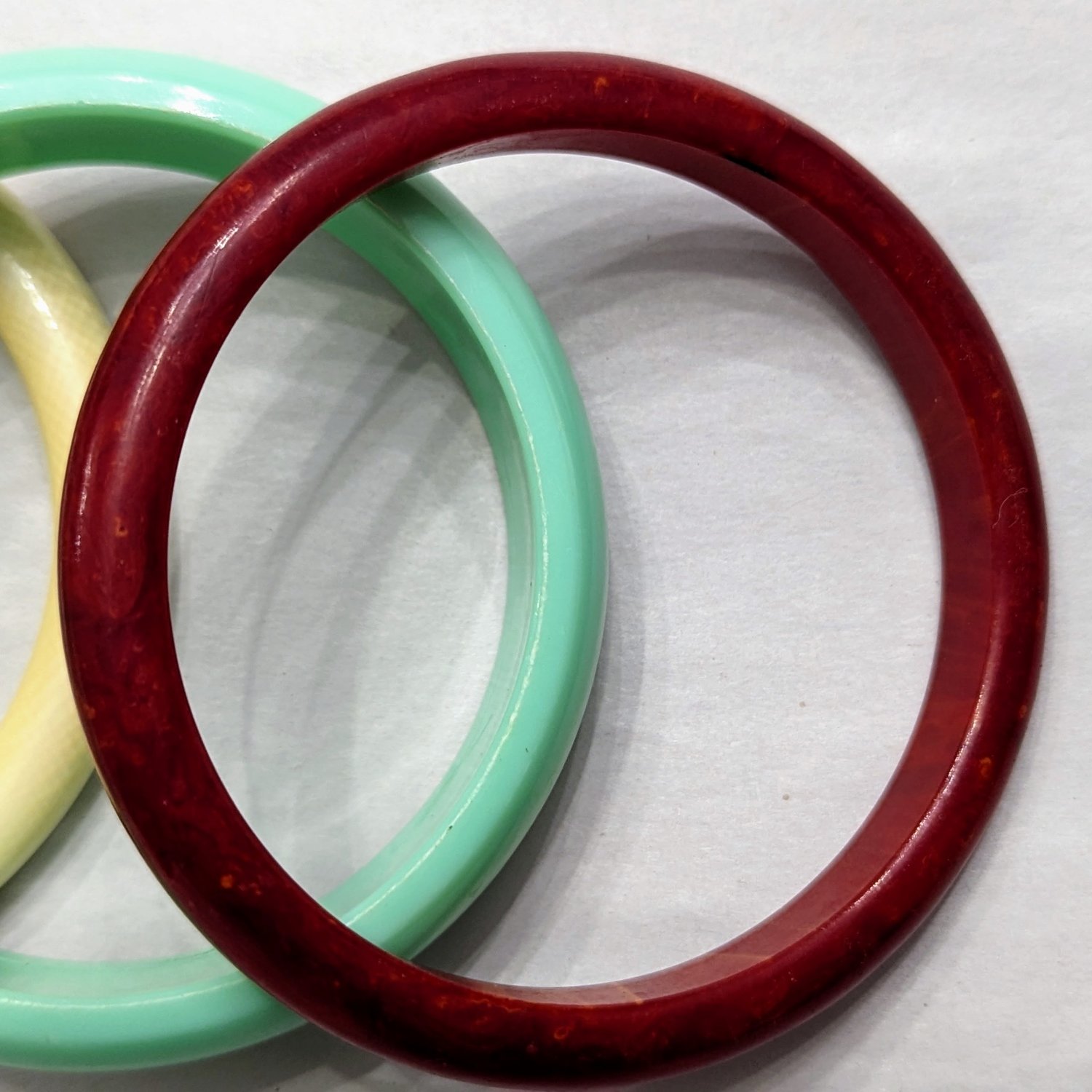 Red Bakelite Plus Two Plastic Bracelets - Image 4